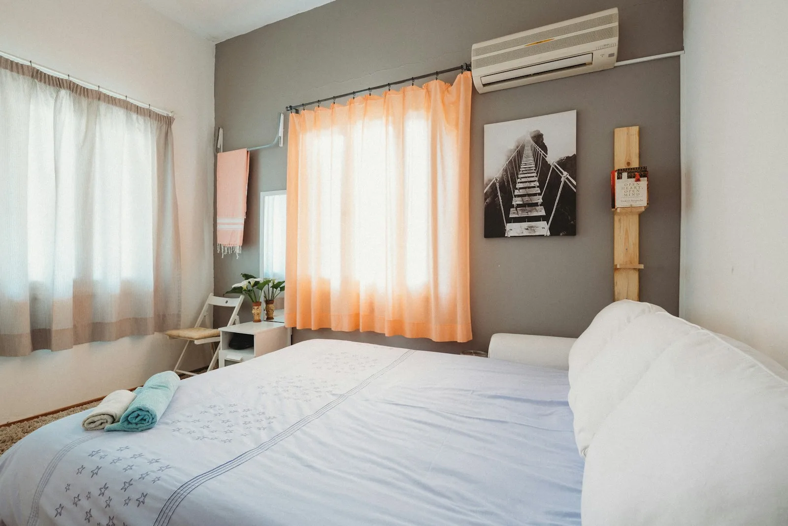 white bedspread inside room