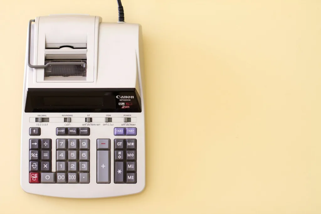 white Canon cash register