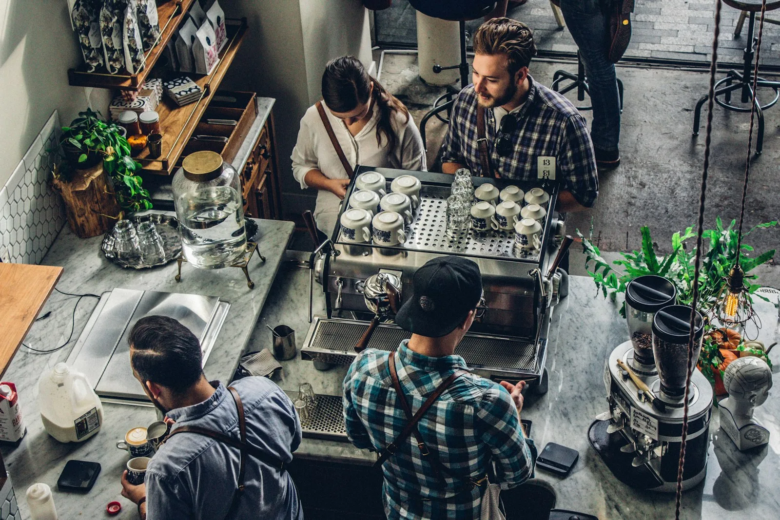 man buying coffee on counter